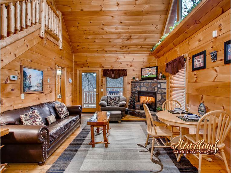 Living room with flat screen TV and gas fireplace